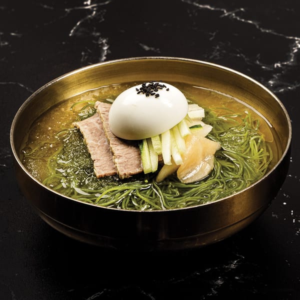 Antoya Korean BBQ's cold noodles with beef, cucumber, pickled radish, and a hard-boiled egg.