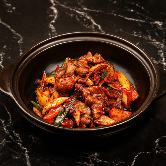 Spicy Stir-Fried Pork Shoulders.