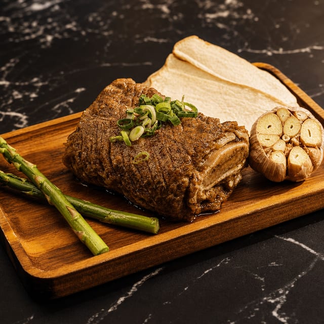 Signature Marinated Short Rib (Galbi).